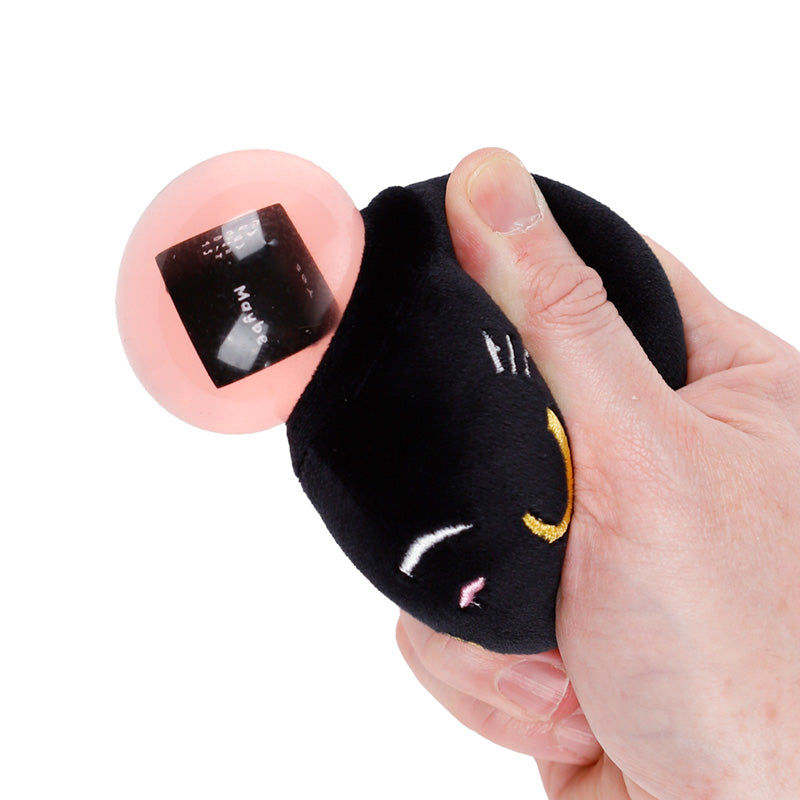 Mačkací zvířátko Queasy Squeezies — věštecká černá kočka